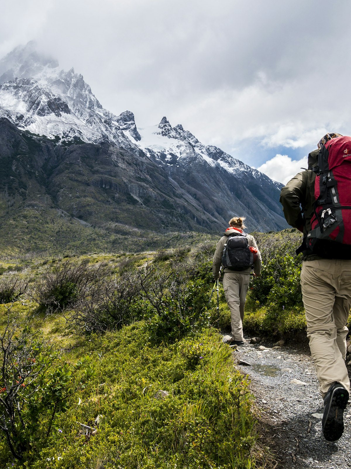Hiker overlooking a dramatic mountain valley