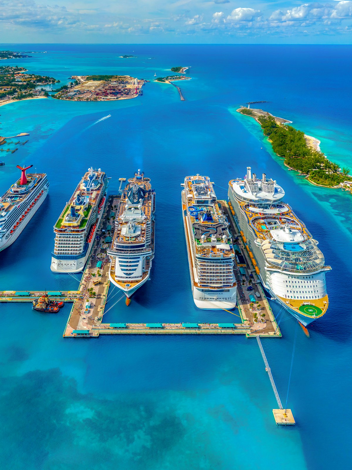 Cruise ship sailing across a calm blue sea